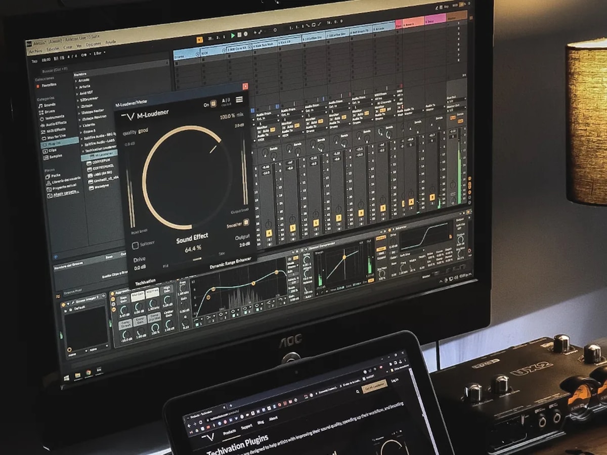 Computer screens displaying software in a working studio.